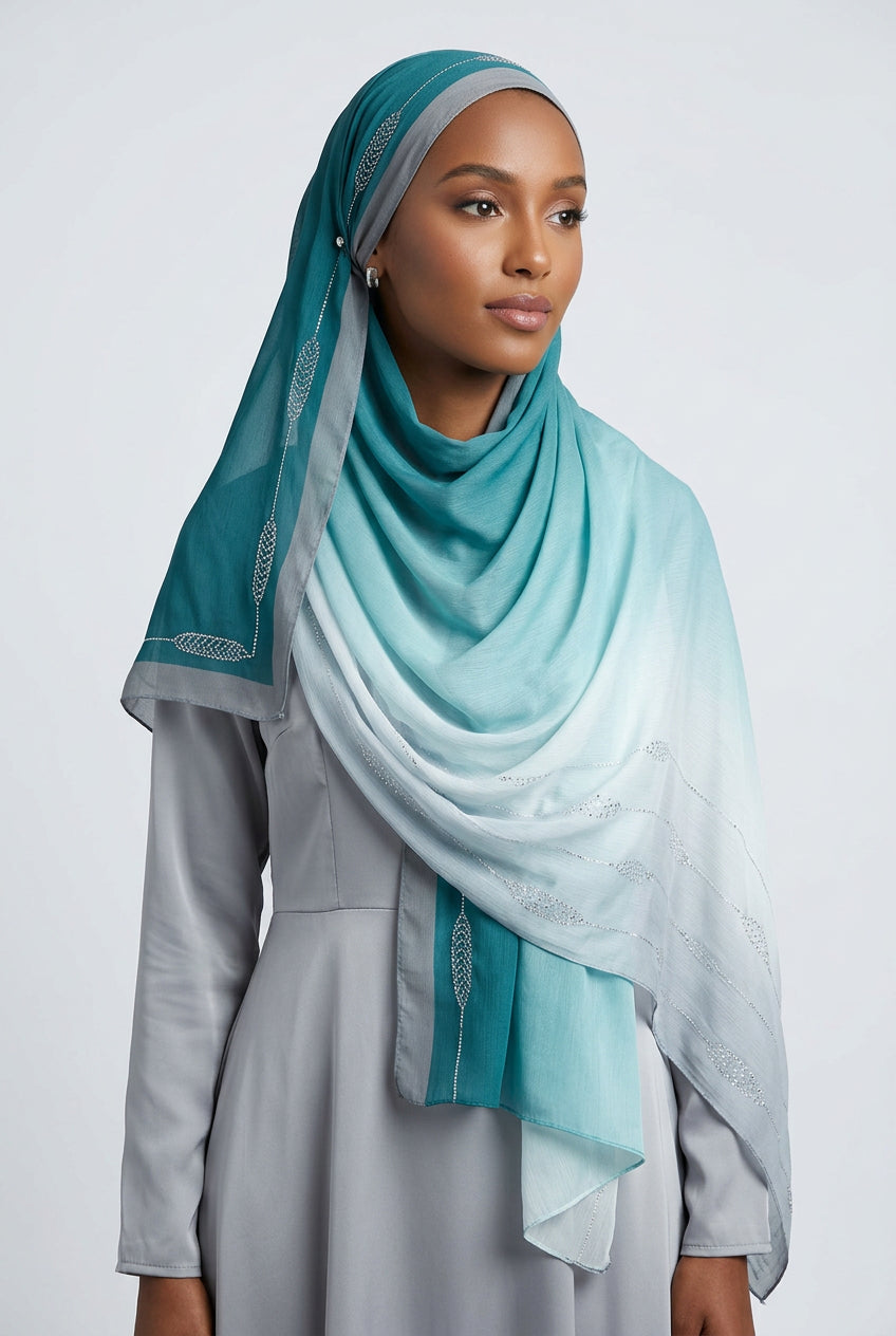 Gradient scarf transitioning from light blue to white on a white background