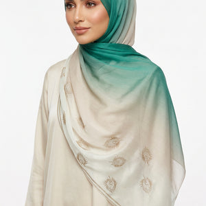 Teal and beige scarf with floral patterns on a white background