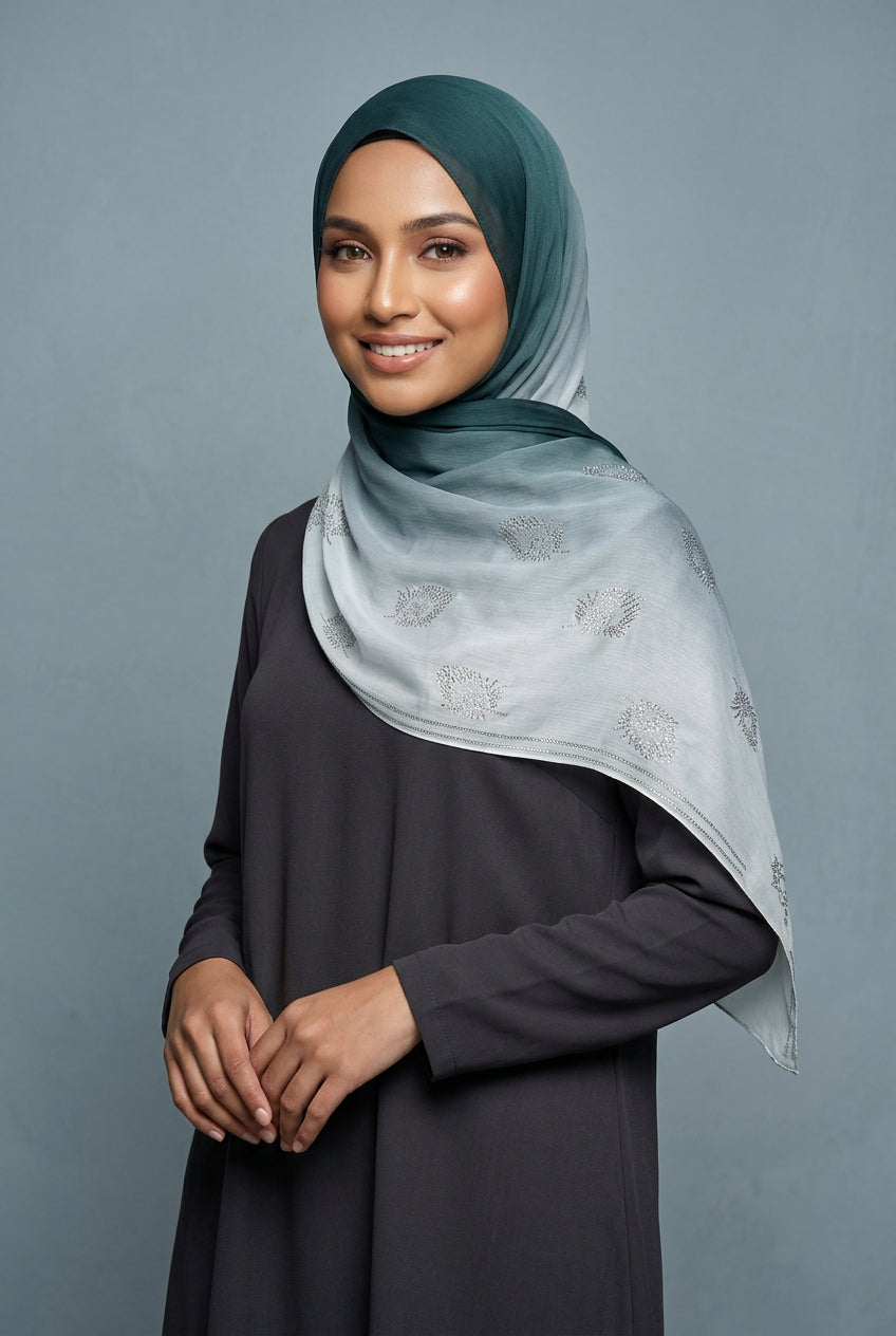 Light blue scarf with floral patterns on a white background