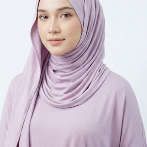 Roll of light purple fabric on a white background