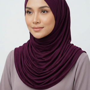 Roll of purple fabric on a white background