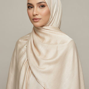 Close-up of beige fabric with folds