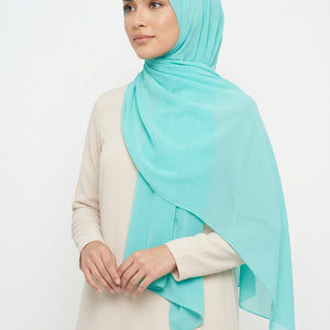 Turquoise scarf on a white background
