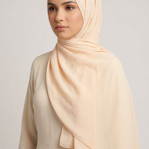 Beige scarf on a light gray background