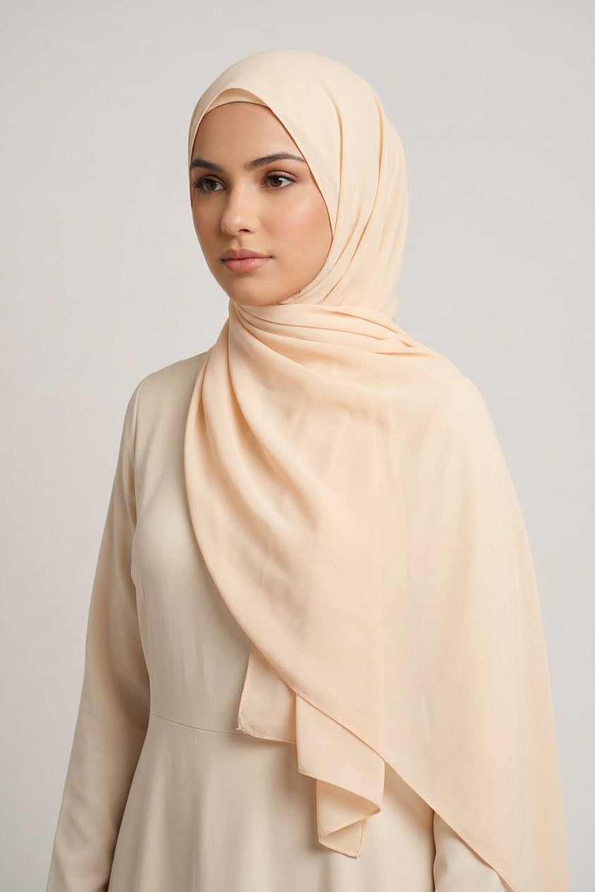 Beige scarf on a light gray background