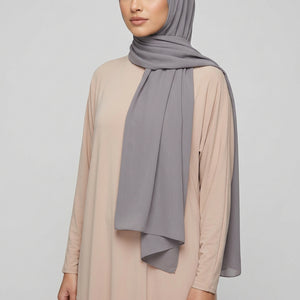 Gray scarf on a white background with 'AMELEEN' branding.