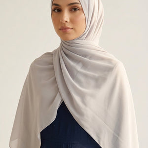 Light gray scarf with subtle pattern on a white background