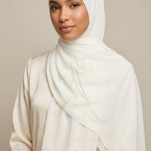White scarf with gold embroidery on a white background