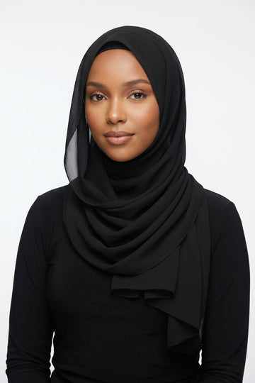 Black scarf on a white background with 'Melen' branding.