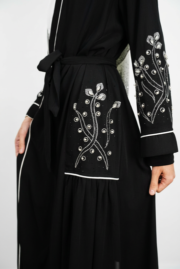Abaya sleeve and hip-panel detail