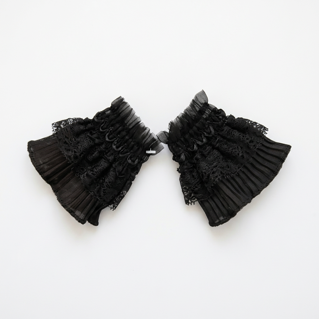 Black lace cuff worn with plum sleeve