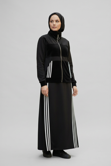 Black skirt set on a clean studio background