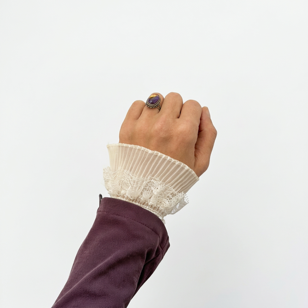 Cuff worn with plum sleeve, first view