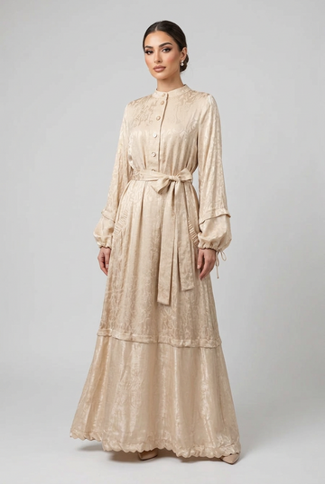 Elara Maxi Dress on a mannequin in champagne