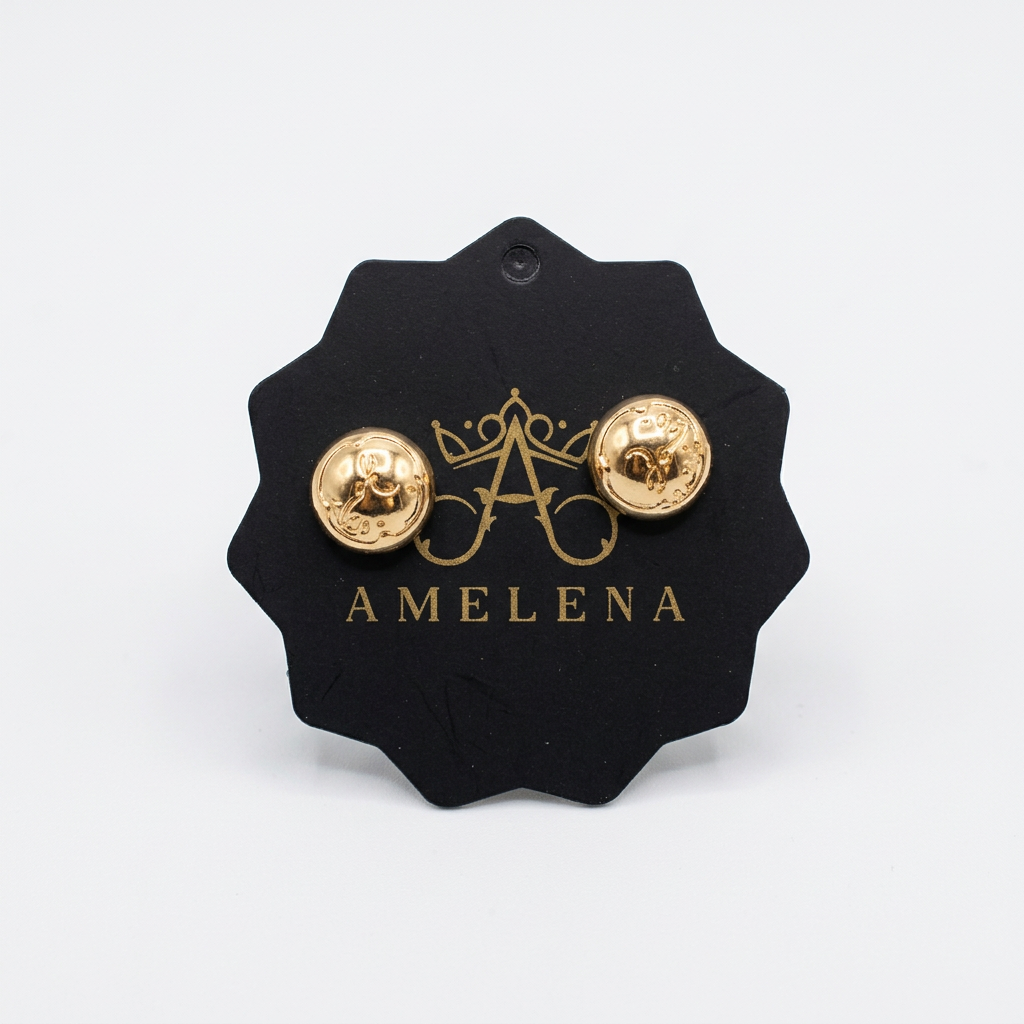Gold magnetic pins on a clean white background