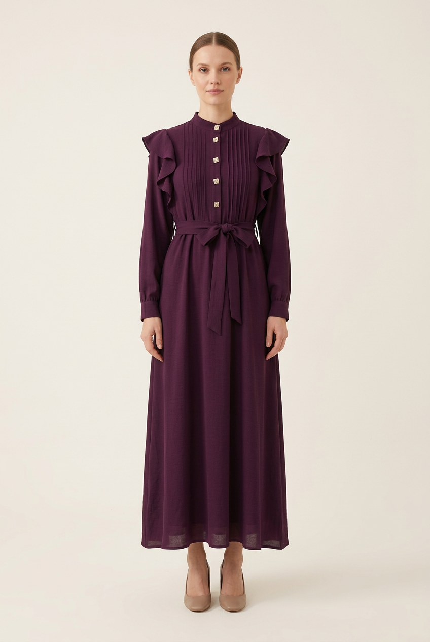 Purple dress on a model in a clean studio setting