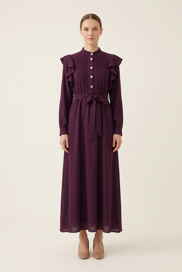 Purple dress on a model in a clean studio setting